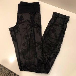 Lululemon Speed tight in black floral, size 4